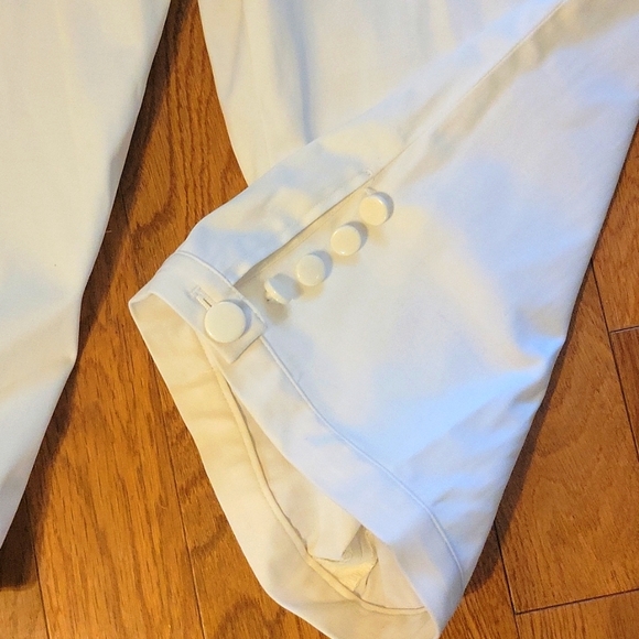 Sharango creme knee knocker pants with accent buttons. Zipper and button closure - Picture 2 of 7